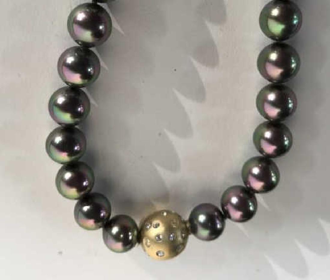 Tahitian Pearl Style Necklace with Ball Clasp: Tahitian Pearl style Necklace with Ball Clasp, peacock colored Tahitian pearls, approx 10 -11mm, 16 in length, ball clasp doesnÂ’t seem to open, has Florentine finish with rhinestones, good conditi