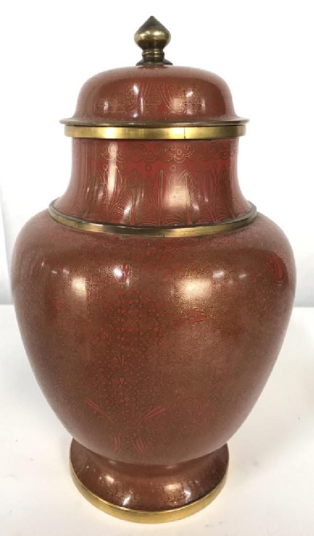 Red & Toned Cloisonné Ginger Jar: Ginger jar is red & gold toned. Contains intricate gold toned pattern detail. Includes lid. Appears to be vintage . Measures approx 11 inches tall 6.5 inches wide. oriental, asian arts and crafts, asi