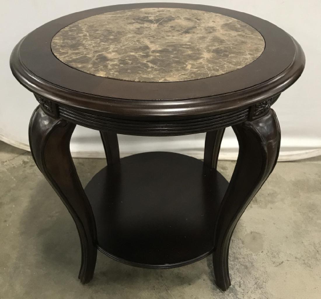 Dark Toned Circular Wooden Side Table W Stone Top: Dark Toned Circular Wooden Side Table With brown Stone Top, Carved Wooden Detail around sides, cabriole legs, and lower shelf. Some scuffs to wood on legs. Measures approx 27 inches tall x 26.5 inches