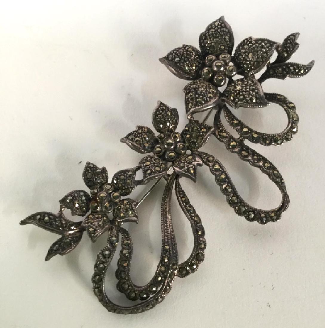 Sterling Art Deco Floral Brooch: Sterling Silver And Marcasite Rhinestone, possibly Antique jewelry, pin, Estate jewelry, vintage jewelry, statement jewelry, womens fashion accessory measures app 4 by 1.5 inches