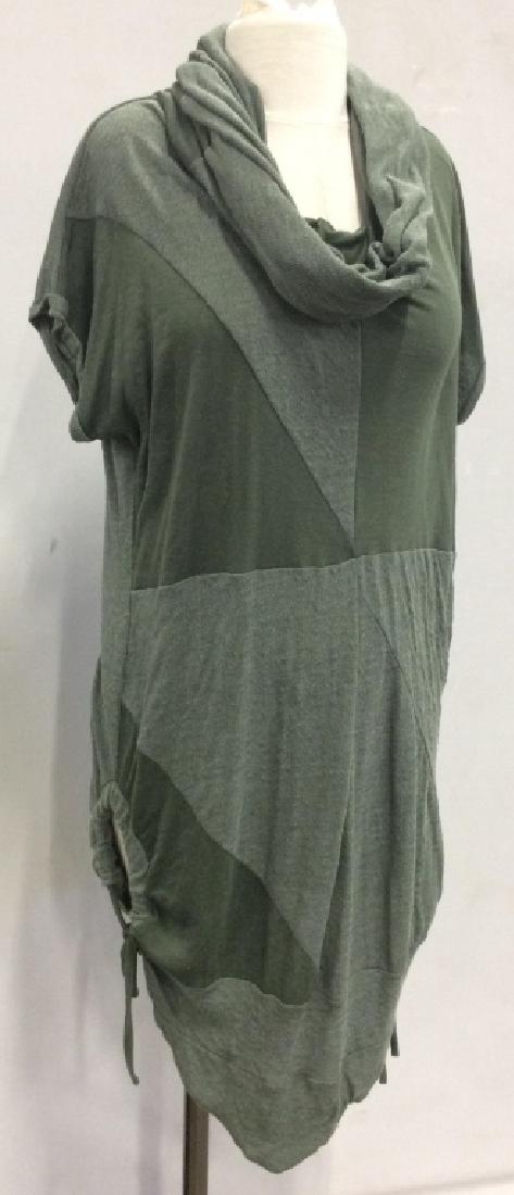 JUNUS COBAN Luxury Designer Tunic: JUNUS COBAN Luxury designer sweater tunic. Luxury Designer tunic, original label for couture designer JUNUS COBAN. Moss green in tone. New designer tunic, originally part of Miami Showroom Boutique, c