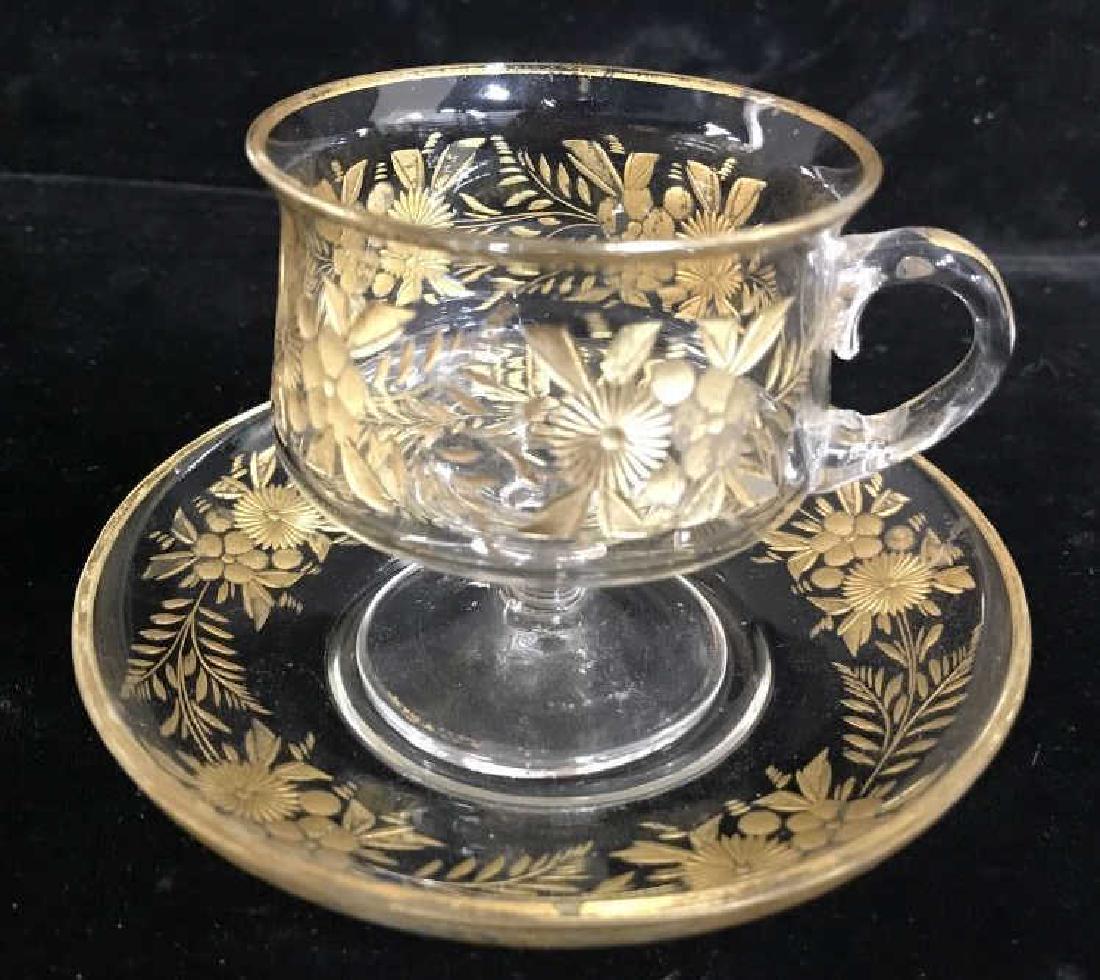 Gold Etched Painted Cup Saucer: Vintage crystal cup and saucer with etched floral design and gold hand painted cup, tableware, collectible, ht app 3.5 inches, saucer diameter app 5 inches