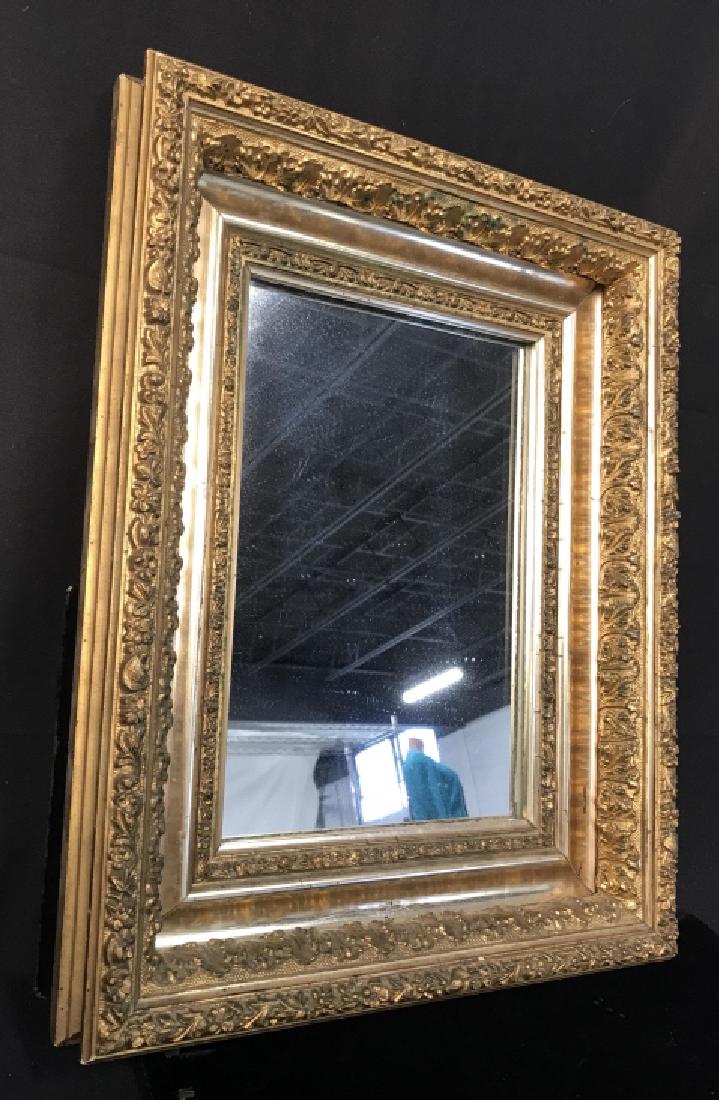 Antique Gold Leafed Framed Mirror: Antique carved wood frame gilded and gold leafed, Mirror is new, Measures app 18 by 13.5 inches, depth app 2.5 inches