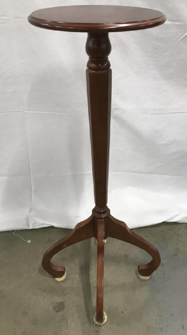 Bombay Company Wooden Pedestal: Vintage Bombay Company Wooden Pedestal with four footed base. Marked on underside Bombay Company. Plant Stand. Sculpture Stand. Measures approx 35 inches tall x 16 inches in diameter at base. Minor ni