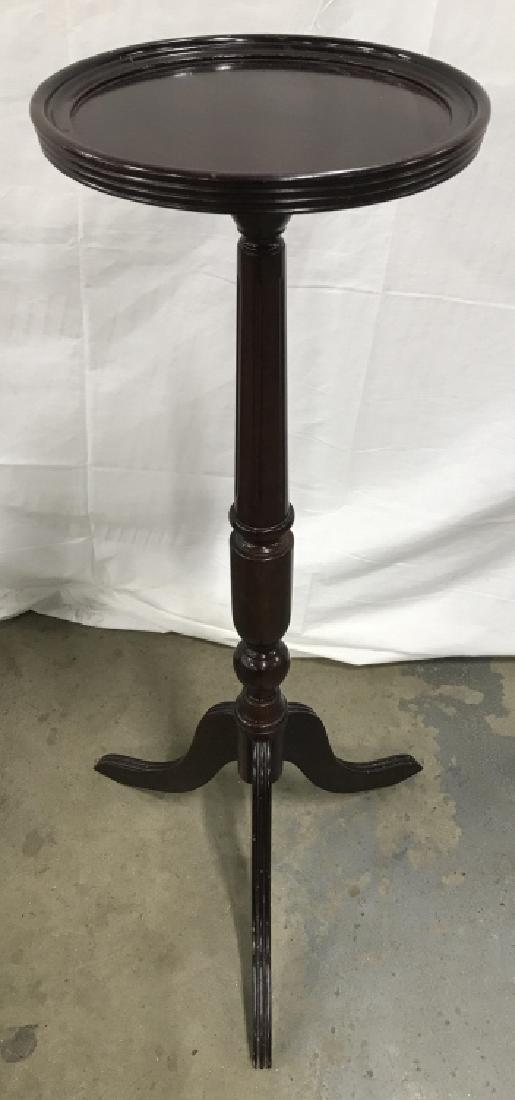 Bombay Company Three Footed Pedestal Plant Stand: Bombay Company Dark Toned Wooden Three Footed Pedestal Plant Stand, turned wooden base and marked on underside Bombay Company. Measures approx 35 inches tall x 11 inches in diameter at top. Minor surf