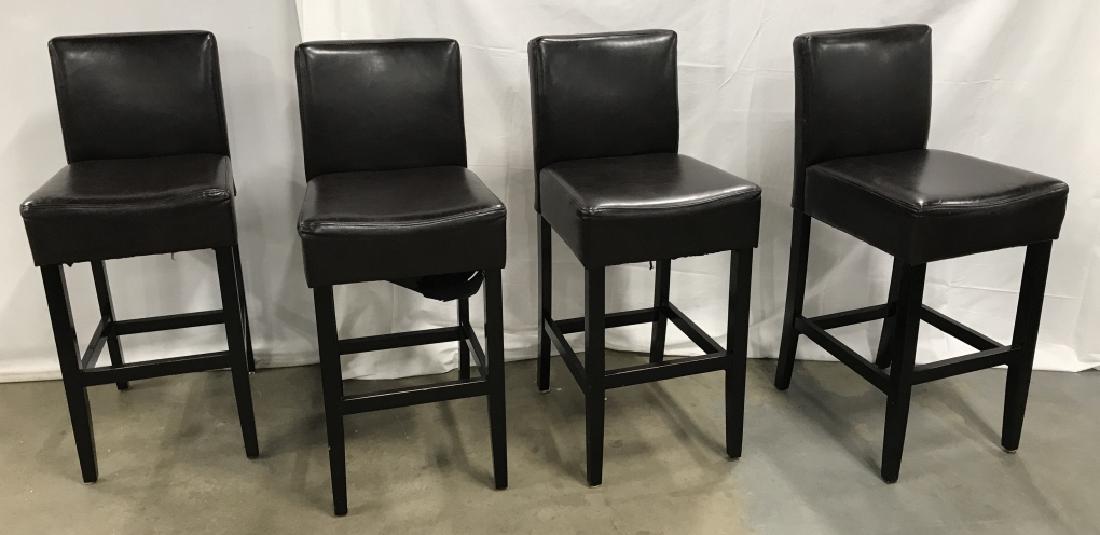 Set 4 Bar Stools Counter Stools: Set 4 bar Stools with upholstered seat and back in a dark toned possibly imitation leather upholstery and painted black wooden base. Some chips and scratches to base and underside needs reattaching. M