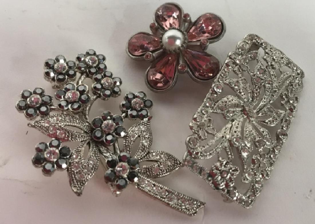 Lot 3 Art Deco Rhinestone Brooches, Jewelry: Estate jewelry, silver toned marcasite and rhinestones, Largest measures 3 inches