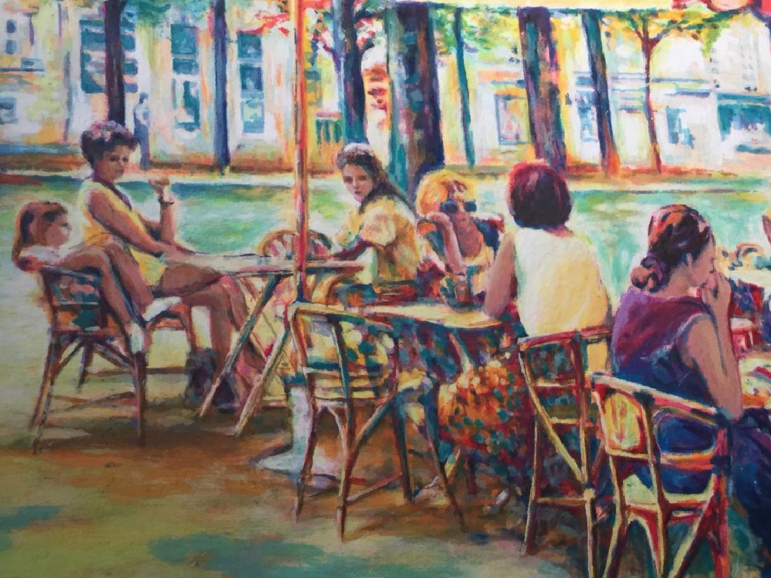 Signed & Framed Oil Pastel Print Of Cafe Scene: Signed and framed oil pastel transfer print of people sitting in outdoor seating of cafe. Signature written illegibly and numbered 100 / 350 in pencil along bottom of image. Artwork is vibrant in colo