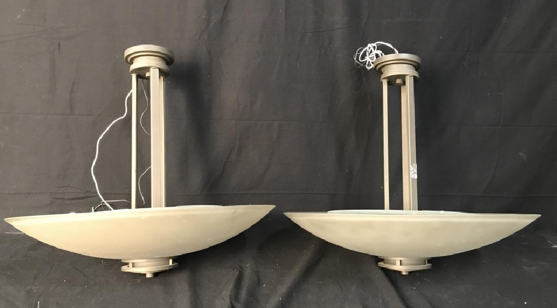 Pair Of Contemporary Pendant Lights: Pair Of Contemporary Pendant Lights with Grey and brass toned metal frames and frosted inverted glass shades. Lights not tested, need cleaning, measures approx 22 inches drop x 24 inches in diameter. 