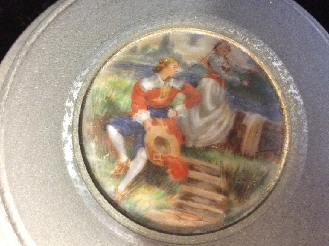 Vintage Mixed Material Music Box: Vintage Mixed Material Music Box, with image of lounging couples/lovers lounging in grassy landscape, on top, 5 1/2 x 4 in, not tested, legs made from possibly Bakelite, Dresser Top collectibles, Tabl