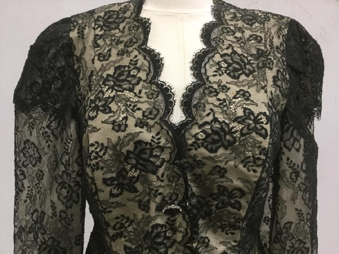 Matching Lace Detailed Women’s Blazer And Skirt: Matching Lace Detailed women’s blazer and skirt. Combo is beige in tone with black tone lace. Blazer / jacket has black tone and rhinestone buttons. No labels noted. Waist in skirt approx 14.5 inche