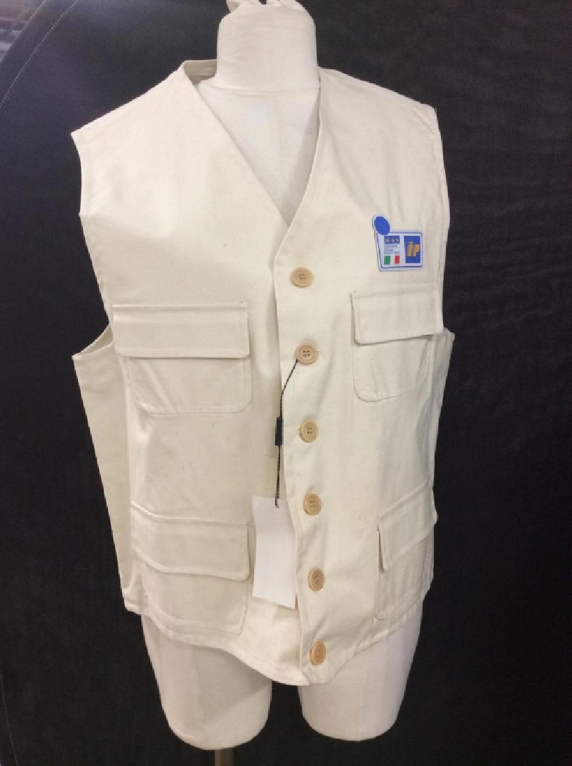 Collectible Cotton Vest W Italian Fed Soccer Patch: Collectible cotton blend vest with the Italian Federation Football Game patch label. Vest is cream in tone. Vest comes with original ‘satisfaction guaranteed’ label with information on vest. Label