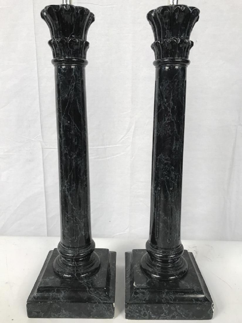 Pair black Toned Composite Pillar Style Lamps: Lamps are black toned. Appearance mimics marble. Each includes finial. Each Measures approx 34 inches tall 6 inches square at base. Has some chips. Pair of VIntage Lamps possibly antique, Candle stick
