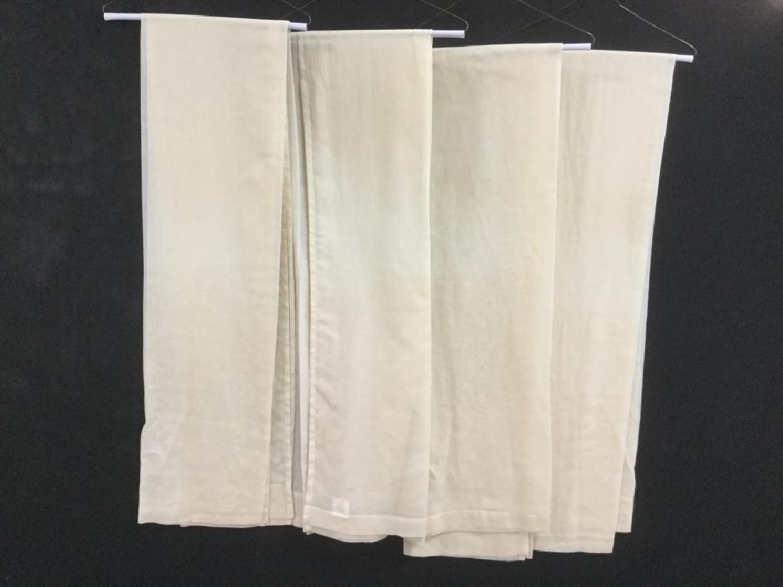 Set of 4 POTTERY BARN Sheer Cotton Curtains: Set of 4 POTTERY BARN sheer cotton curtains in cream tone. Labels on each read Pottery Barn 100% cotton. Each approx 44 inches in width by 84 inches in length. Minor / subtle tear and discoloration no