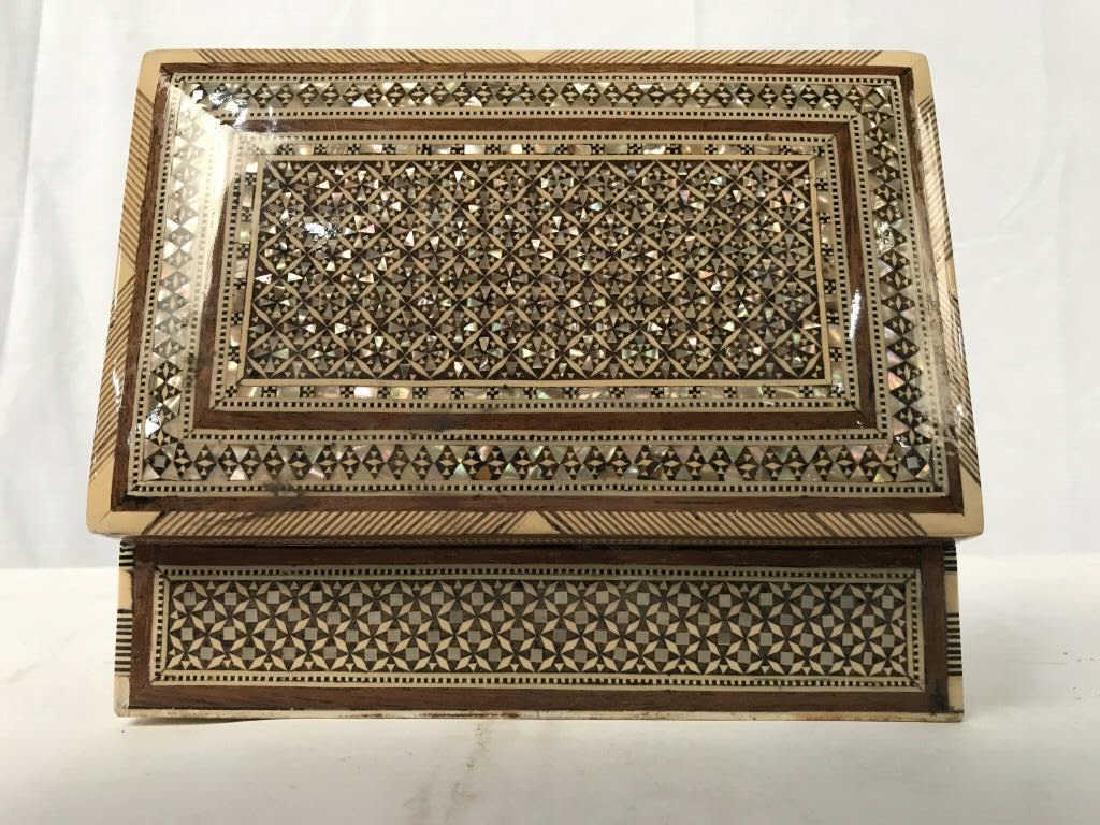 Middle Eastern Mosaic Box W Mother of Pearl: Middle Eastern mosaic box with wood and mother of pearl pieces. Possibly Syrian or Egyptian. Mosaic pattern has mother of pearl inlay. Interior is deep red in tone. Jewelry box / trinket box / keepsak