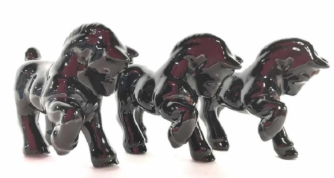 Lot 3 Black Toned Porcelain Horse Figures: Each piece measures approx4 inches long 3 inches tall. Each piece is black toned and depicts horses with 1 hoof raised. Porcelain figurals, table ware, collectibles,6