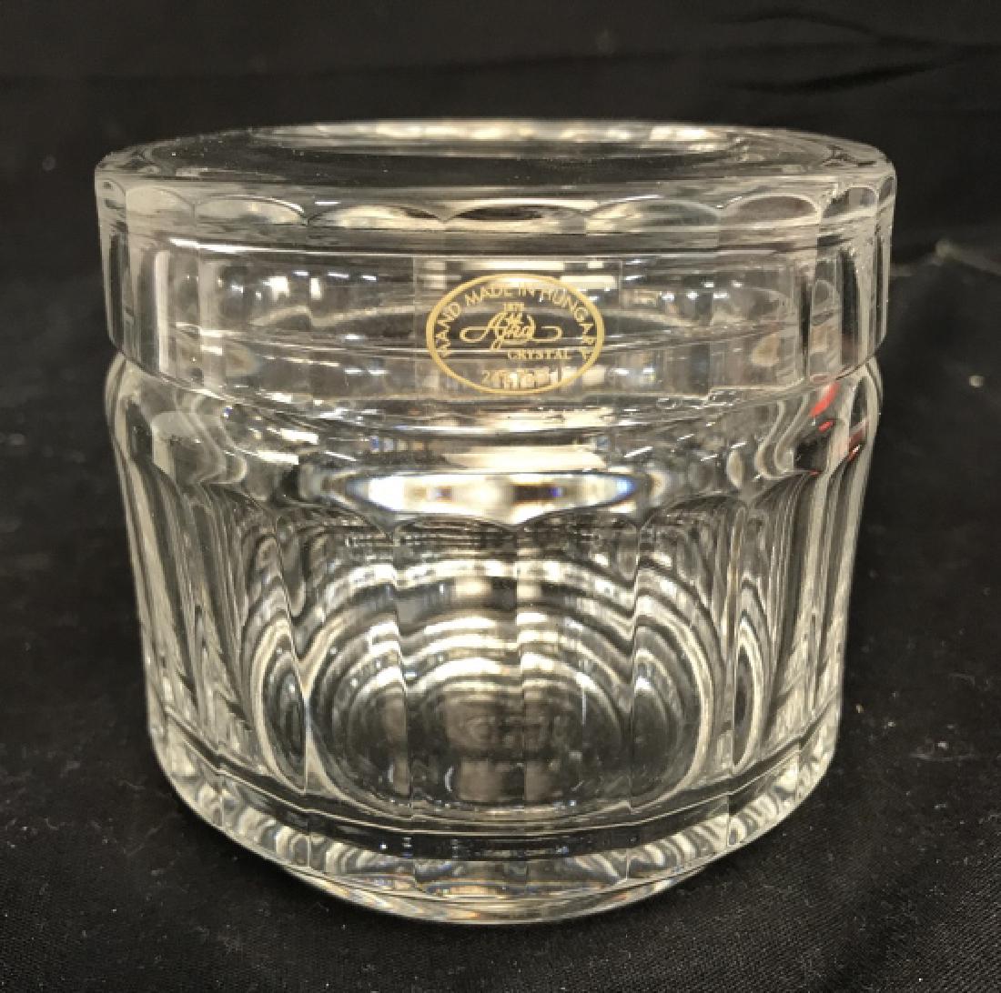 AJKA Crystal Trinket Box: Tag on Trinket Box reads HAND MADE IN HUNGARY AJKA CRYSTAL. Trinket box includes lid. Table ware, desk top accessory, dresser top accessory, Measures approx 4 inches tall and wide. 6