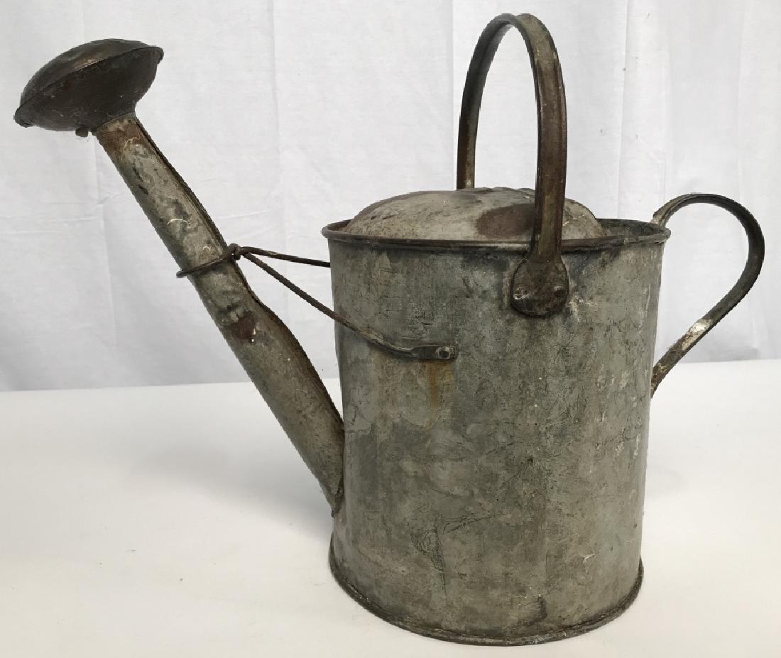 Vintage 2 Gallon Metal Watering Can: Vintage 2 Gallon Metal Watering Can, 15 in high x 20 in at widest point, sturdy, dents, Rusting in places, Vintage Gardening Implements, Vintage Gardening Tools, Collectible Vintage Garden Tools, 5