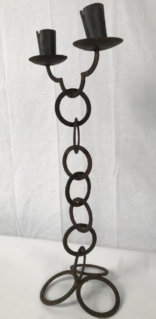 Vintage Metal Iron Standing Modernist Candelabra: Vintage Metal Modernist Candelabra, Hand crafted hand forned iron metal sculptural candle holder, 31 in tall x 12 in at widest point between candle holders, rusted, Formed as joined rings in columnar