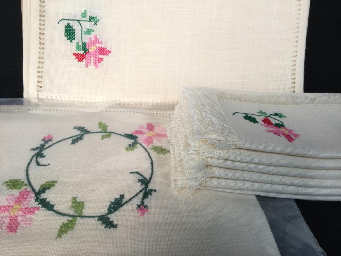 Set of VERA Embroidered Natural Cloth Napkins: Set of VERA Embroidered natural cloth napkins. Cloth is cream in tone with pink and green floral embroidered accents. Lot includes 6 fringe napkins, 8 larger napkins / tea towels, 1 large tea towel. C