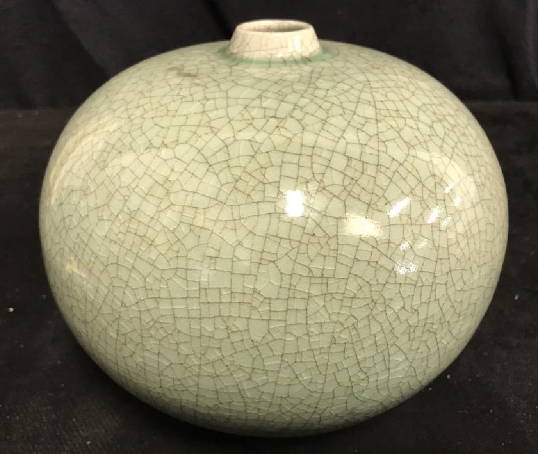 Asian Celadon Green Glazed Ceramic Vessel: Asian Celadon Vessel. Piece contains crackle and crazing glazing finish. Celadon Ceramic vase, vessel, decorative table top accessory, Asian arts and Crafts, Orientalism, Orientalia, Asian Ceramics, A
