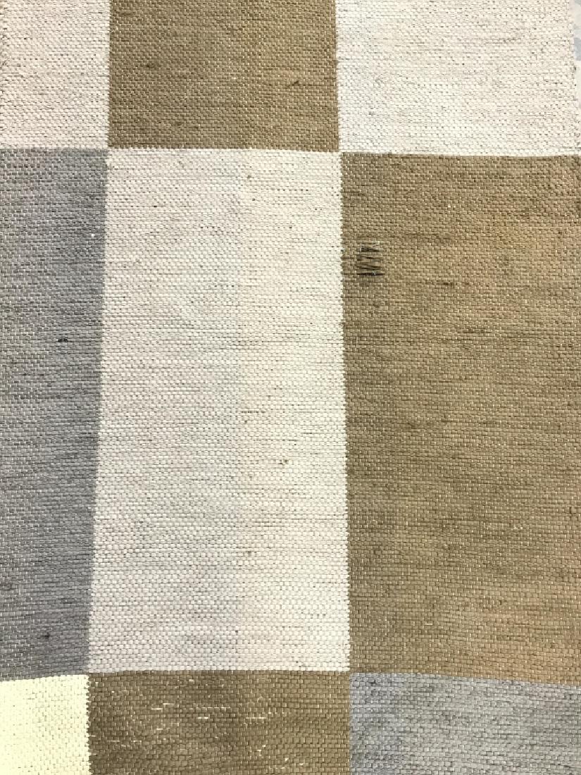 C MILLS Hooked Rug: Carpet rug, throw rug, home accessory, home decor Tag on underside reads C MILLS. Contains tones of brown, slate & yellow. Contains some wear and loosening of weave. Measures approx 69 inches long 49 