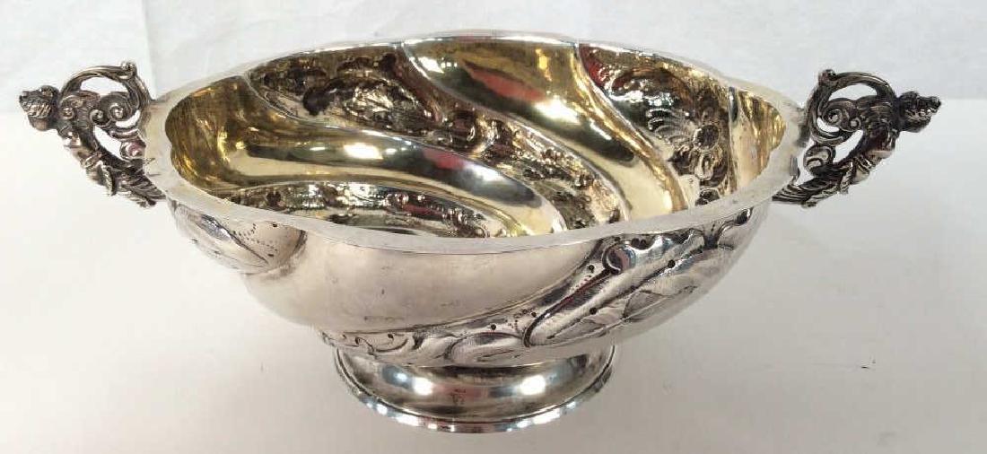 1899 CHARLES STUART HARRIS Sterling Silver Bowl: Antique 1899 CHARLES STUART HARRIS, London sterling silver bowl with embossed floral swag details. Female Figurehead Handles. The interior retains the original gilding. Bowl has inscription on undersi
