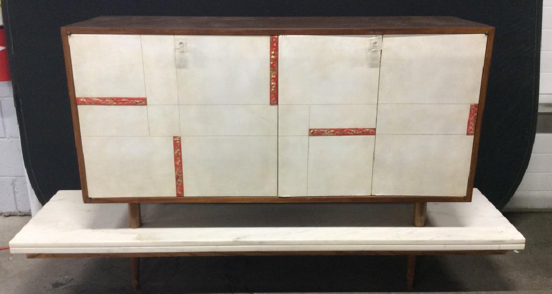 Mid Century Modern Bar With Lucite Handles: Mid Century Modern Bar On Marble Topped Stand, Lucite Handles, white toned panel front with red and gold toned metal rectangular design, interior of bar illuminates when doors are opened, one bulb nee