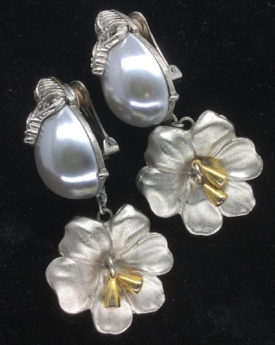 Pair Vintage Floral Drop Earrings: Pair Vintage Floral Drop Earrings Clip on earrings near clips, silver toned bodies with marcasite, decorated with silver toned pearl style cabochon beads, hanging floral pendants with gold toned detai