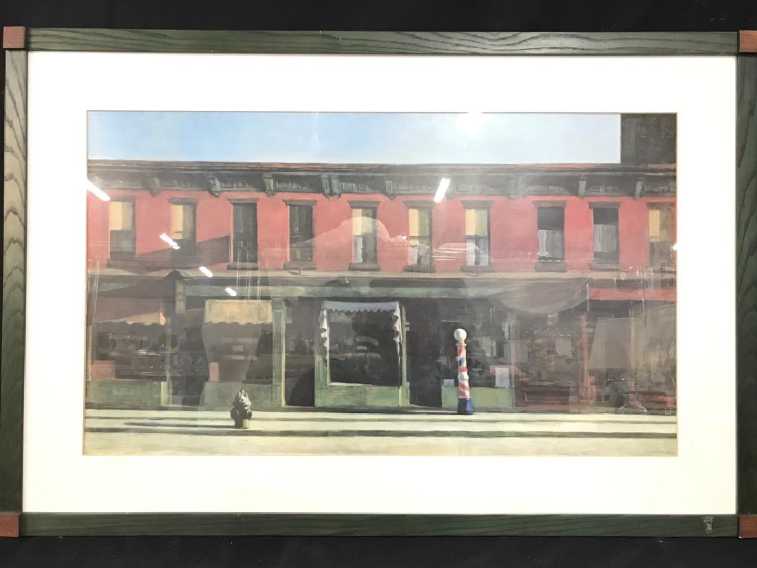 Framed EDWARD HOPPER Print: Print depicts a storefront apartment building. Print is professionally framed and matted with green and brown toned wooden frame. Measures approx 42 inches long 28 inches tall. Wall art, home decor, h