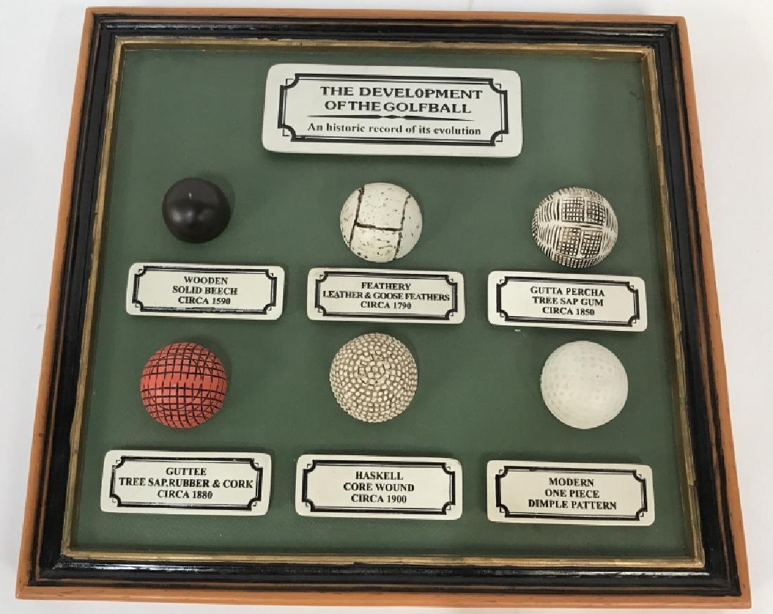 Pair Golfball and Club History Memorabilia Plaques: Pair of golfing memorabilia plaques, each an historic record of the evolution of the golf balls and golf clubs. The plaques and frames appear to be ceramic. Each piece approx 10.5 inches in height by
