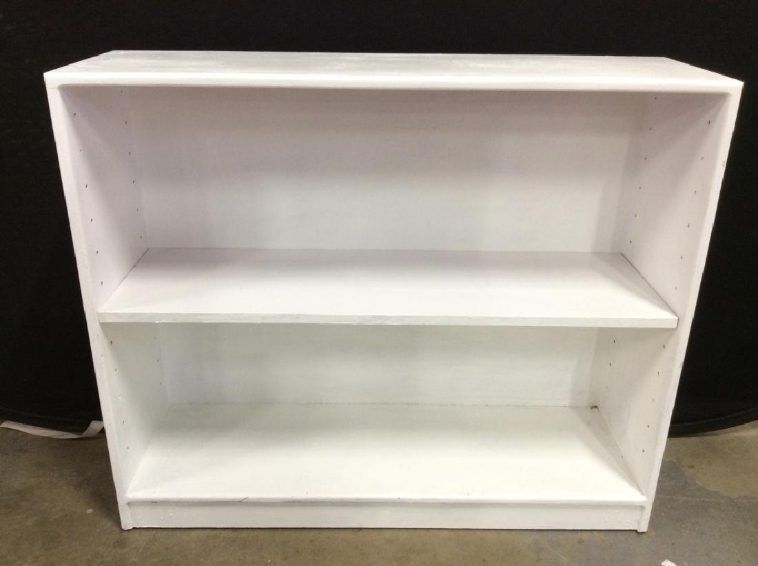 White Toned Wooden Bookshelf: Bookshelf is wooden and white toned. Includes 1 shelf. Appears to Be Vintage. Measures approx 36 inches long 30 inches tall 11 inches deep. Home accessory, furniture, bookcase, book shelf 6.