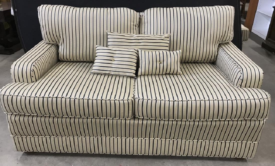 Love Seat W Striped Fabric Upholstery: Loveseat with striped fabric upholstery. Fabric is light beige in tone with white and black stripes pattern. Possibly a silk blend fabric. Comes with three upholstered Throw Pillows. High End Home Fur