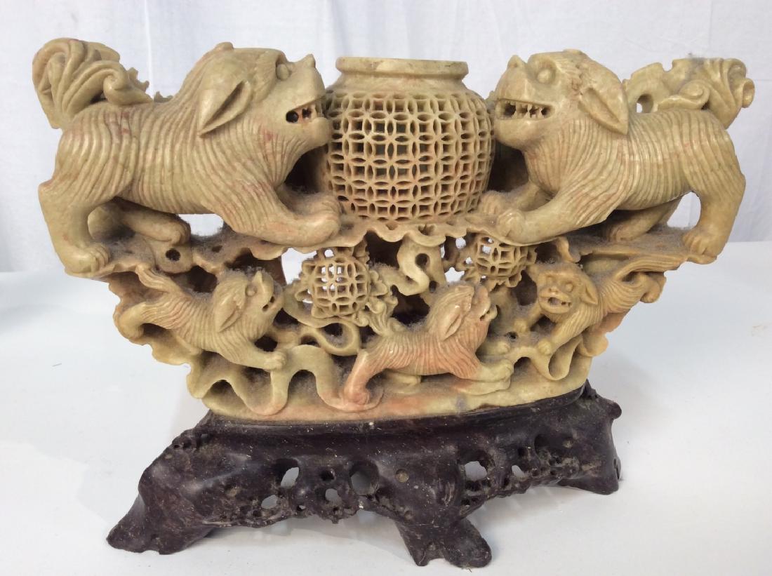 Asian Carved Soapstone Sculpture on Stand: Asian Carved Soapstone Sculpture on Stand, 8 1/2 in high x 12 in long x 2 in width, depicting Foo Dogs with Puppies guarding baskets, base possibly natural stone hardstone, good condition, possibly An