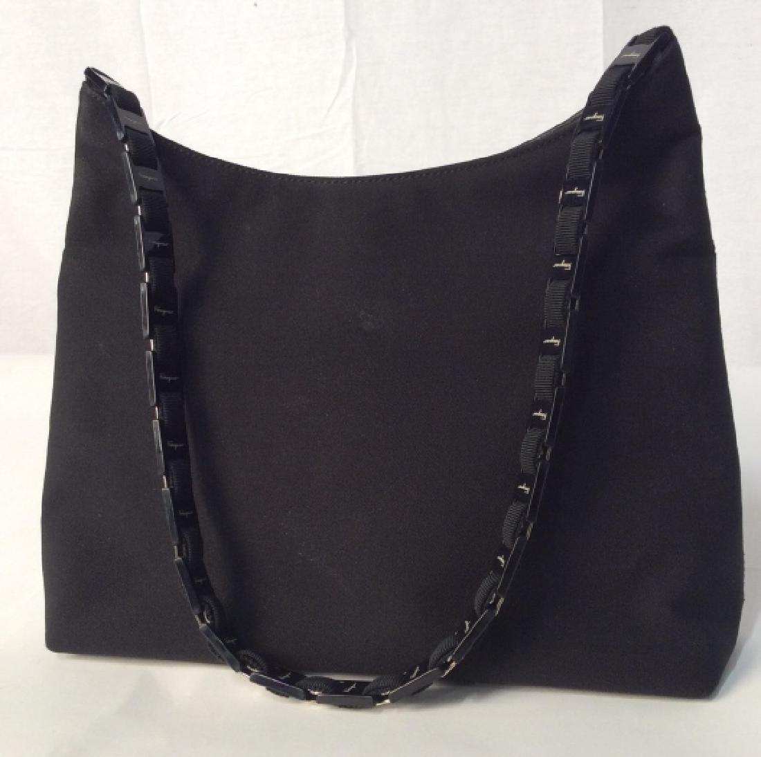 Ferragamo, Ladies Fabric Shoulder Bag,: Ferragamo, Ladies Fabric Shoulder Bag, 10 in x 12 in, 2 in width, Good condition, shoulder strap has Black Brick shaped Tablets inscribed with Ferragamo, alternating with woven fabric, black fabric bu