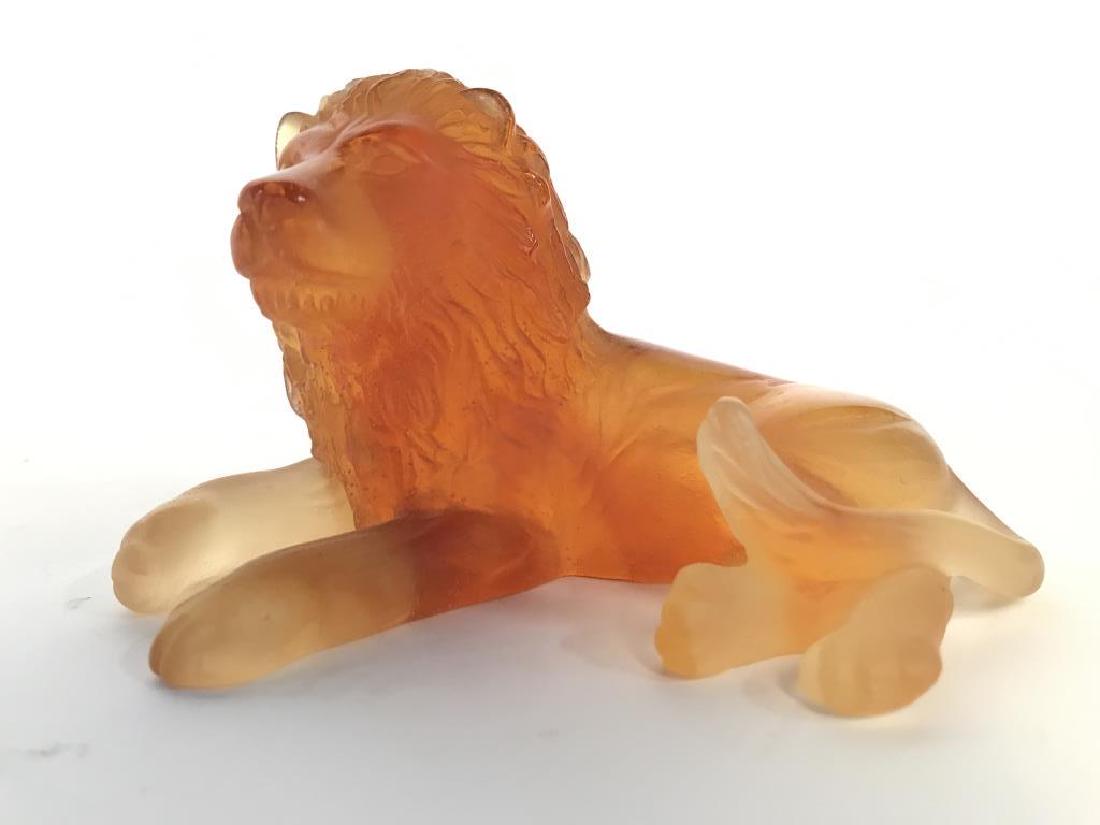 DAUM FRANCE Cut Crystal Lion Figure: Underside is marked DAUM FRANCE. Figure depicts a seated lion figure. Piece is Amber toned. Measures approx 5 inches long 3 inches tall and wide. Art Deco, French Art Glass, Crystal Lion, Lion Sculptu