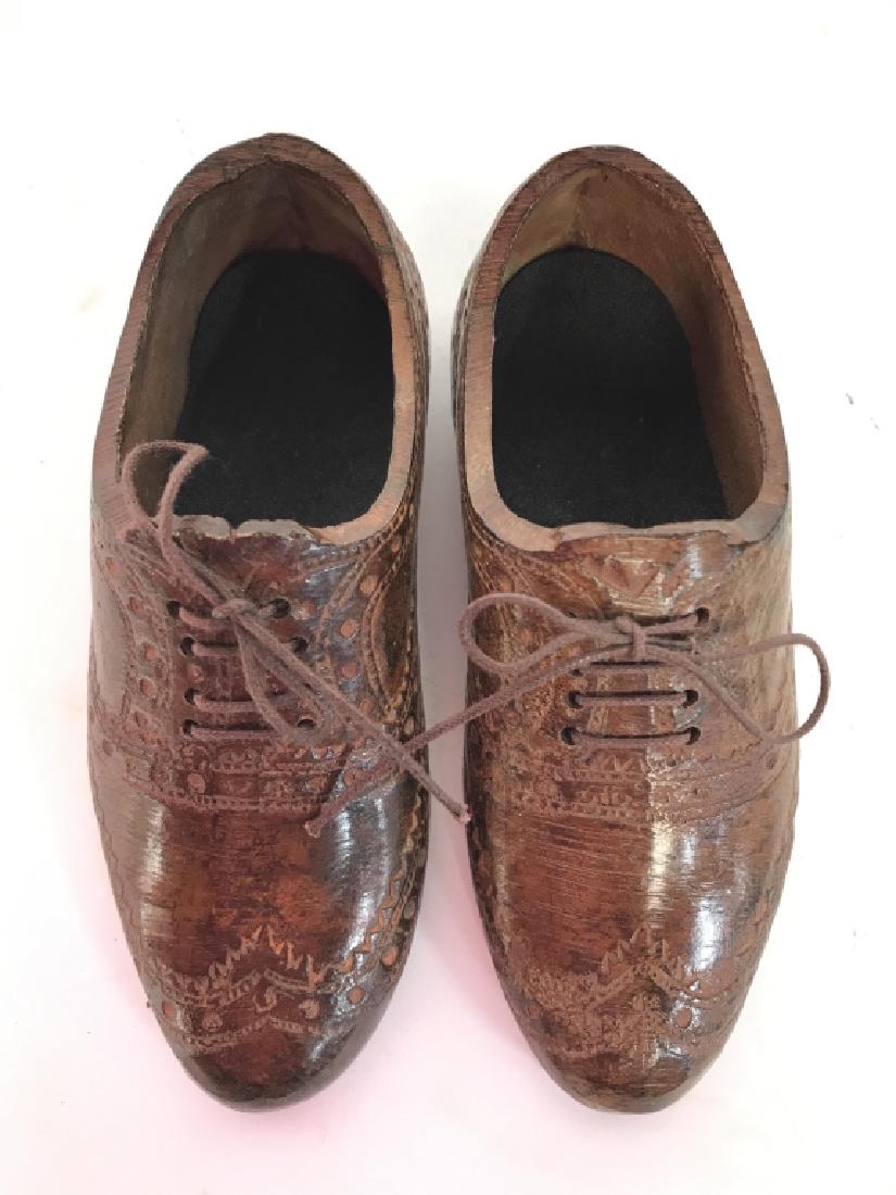 Pair Ceramic Men’s Shoe Figurals: Lot include 2 brown toned ceramic dress shoe Figurals. Each have miniature laces. Contains intricate detail. Each measures approx 5 inches long. decorative accessory, home decor, shelf piece Property