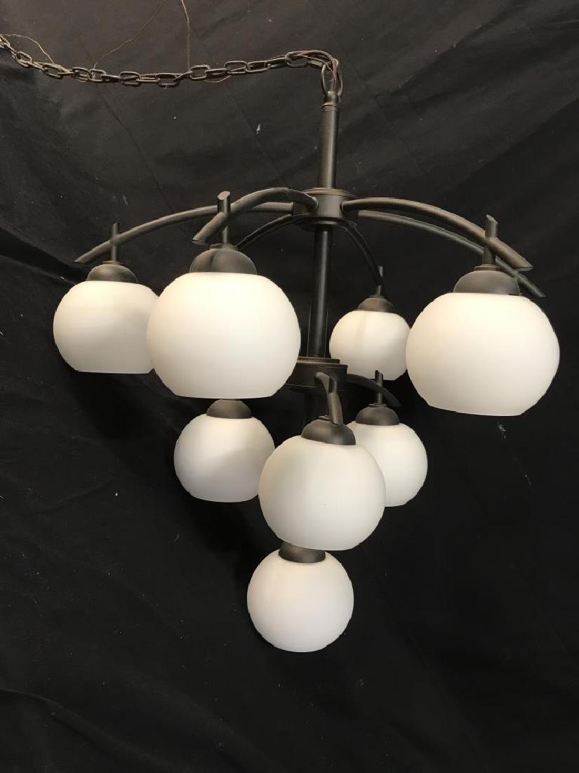 Modern 10-Bulb Orb and Stem Statement Chandelier: 10 bulb globe / orb / sphere and stem chandelier. Black tone stems extend outward and downward into globe / sphere shaped etched white glass shades. Chandelier is approx 32 inches in height by 30 inch