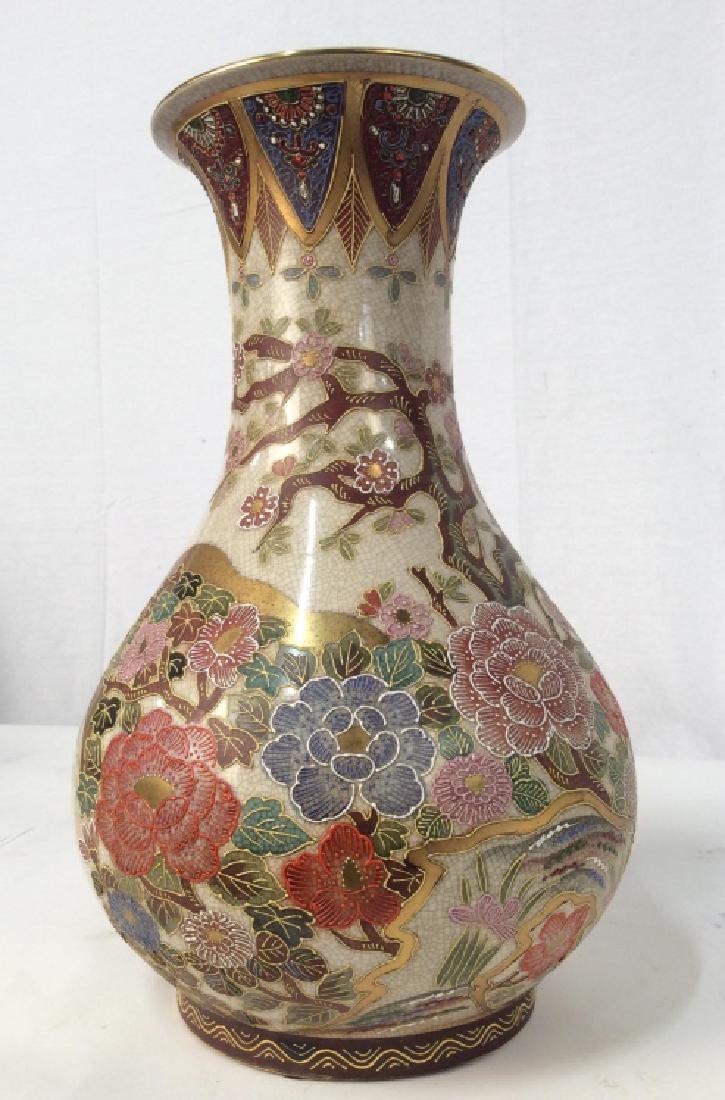 Oversized Asian Enameled Vase, Signed: Oversized Asian Enameled Vase, 15 in tall x 11 in at widest point x 6 7/8 in at opening, soft Floral designs on cream ground, Gourd shaped form, underside signed in red Asian Characters, good conditio