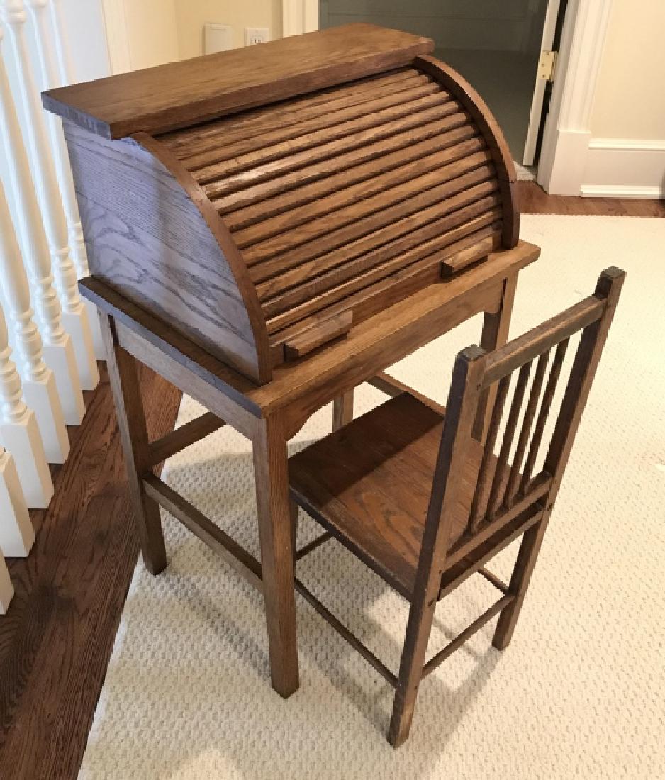 Set 2 Child’s Oak Toned Roll Top Desk And Chair: Set 2 Intage Possibly antique Child’s Oak Toned Wooden Roll Top Desk And Chair, marked on underside of chair Made by Paris MFG. CO. South Paris, ME USA No 326, some scratches and nicks due to age an