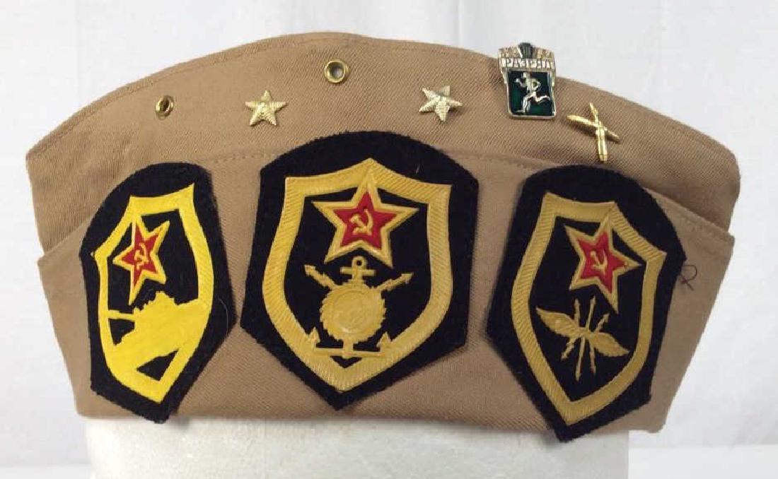 Russian Military Hat WWII Pins, Patches, Medals: Russian Military Hat WWII Pins, Patches, Medals, like new, 23 in circumfrance of the Inside Seam Of Hat, 5 in bottom to top, inside Marked 56 with Cyrillic Letters, War memorabilia, history, historica