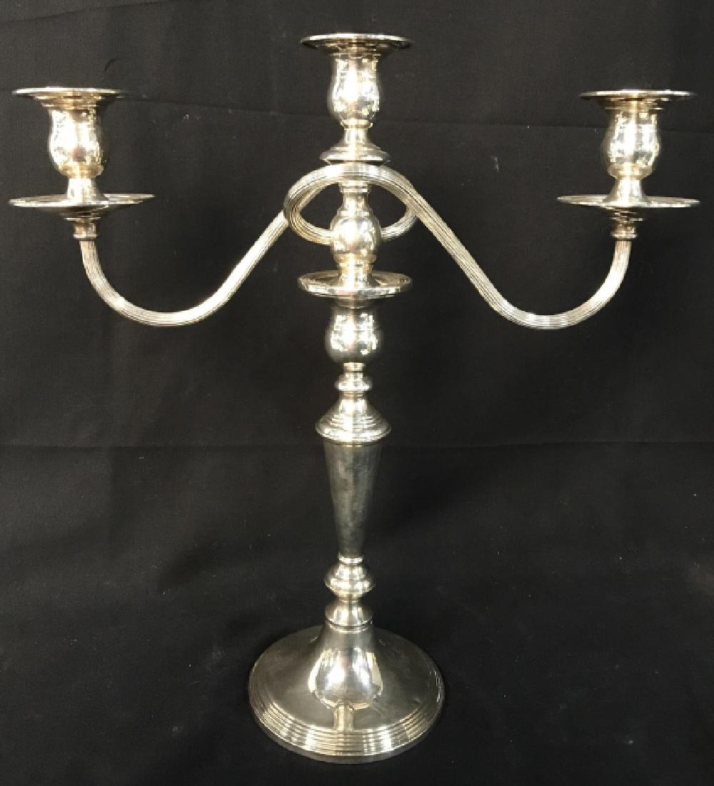 Sterling Weighted 3 Arm Candelabra: Underside reads STERLING WEIGHTED. Piece contains 3 arms. Sterling Candelabra, sterling Candlestick, silver Candelabra. decorative accessory, tableware, tabletop accessory Measures approx 14.5 inches