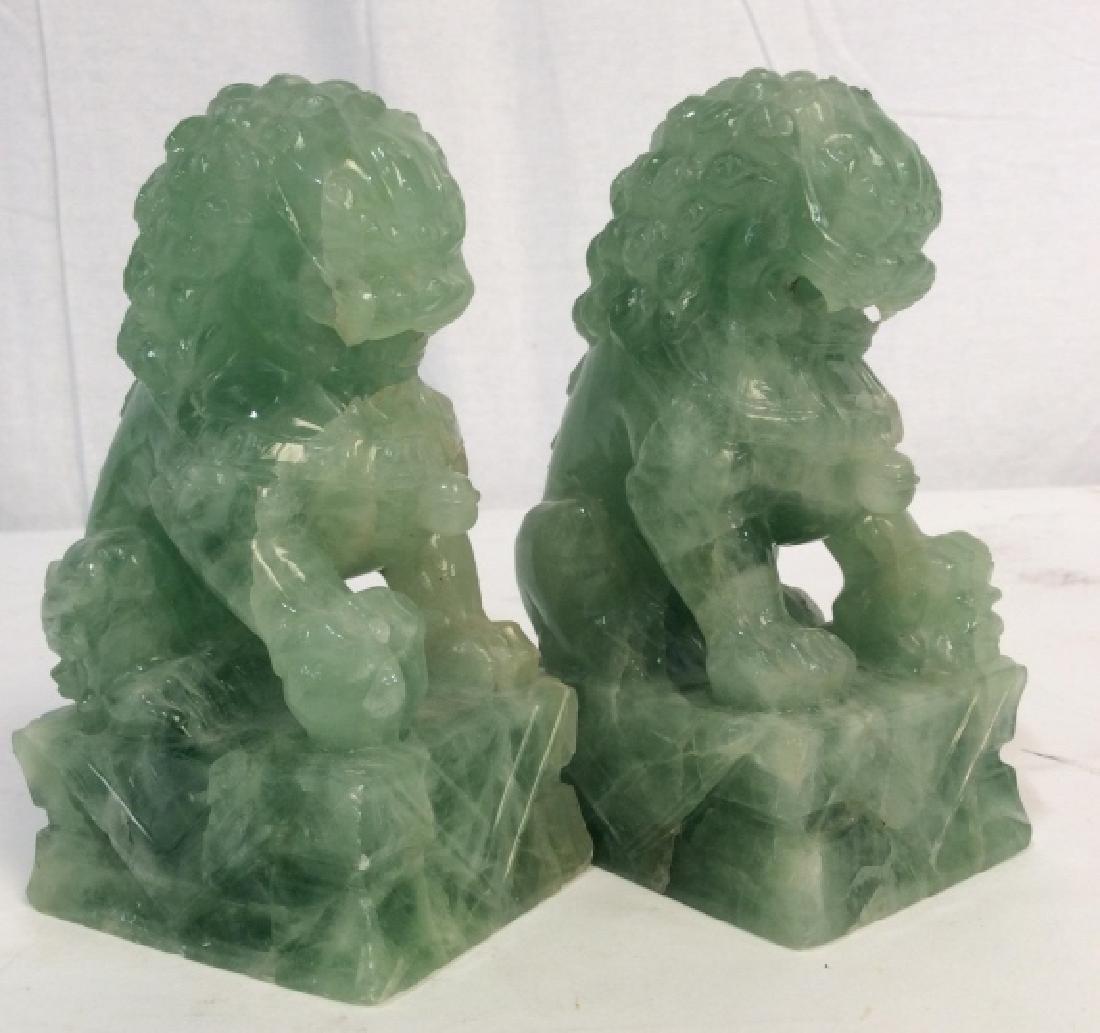 Pair Chinese Quartz Foo Dogs: Pair Chinese Quartz Foo Dogs, 6 1/4 x 3 7/8 in square at base, green quartz, on pedestals each has paw on Orb, mouths curled in snarl with teeth showing, Good condition, Asian Hardstone Natural stone,