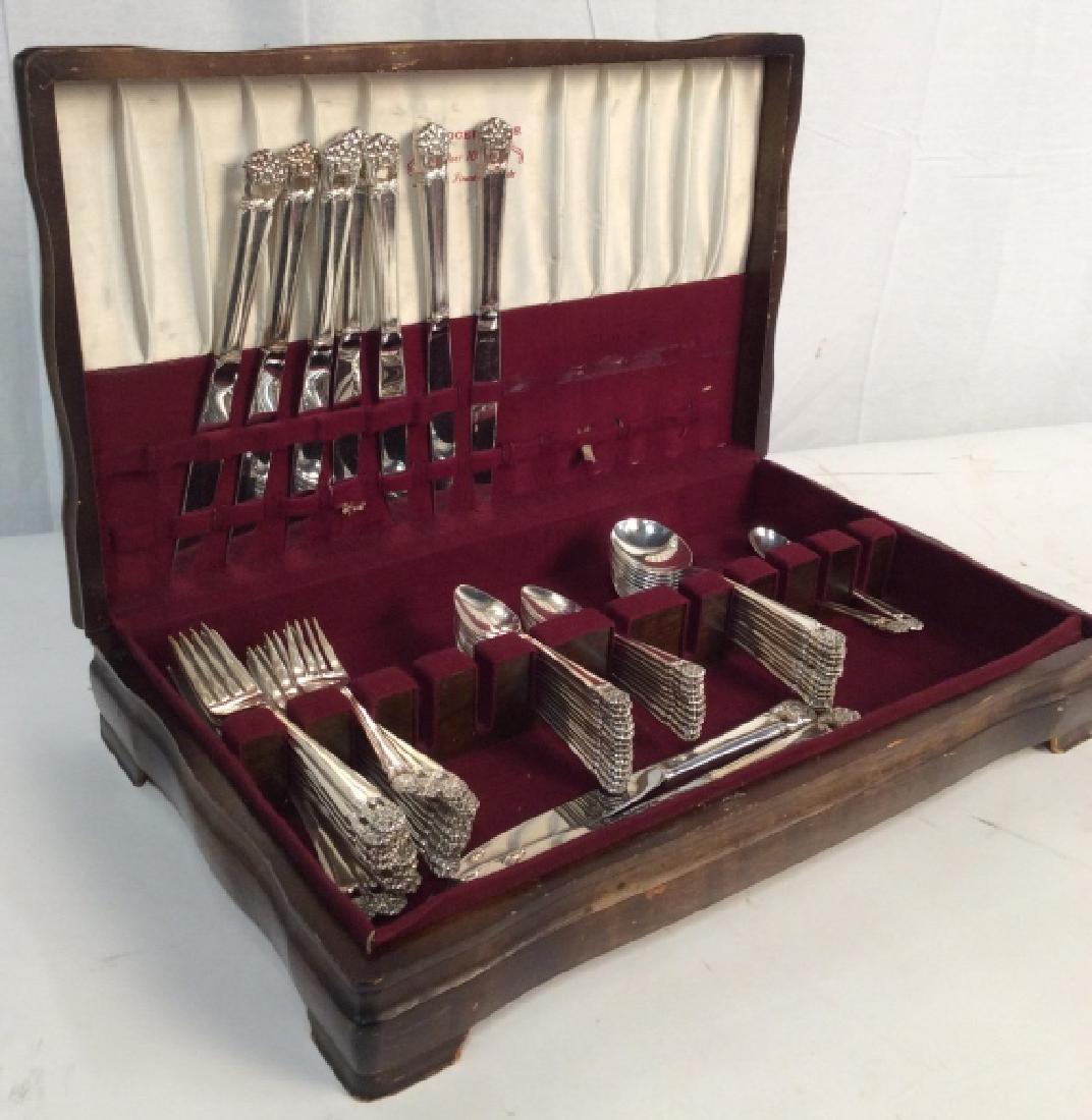 1847 Rogers Bros. 72 piece Silver Toned Flatware: 1847 Rogers Bros. Cased 72 piece Silver Toned Flatware Set, 11 knives, 11 dinner forks, 12 salad forks, 24 teaspoons, 12 soup spoons, 1 butter knife 1 ice cream spoon, in original box which has damage