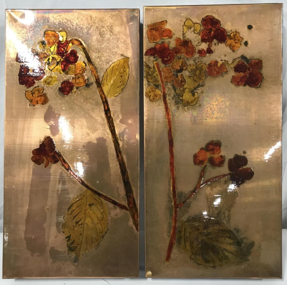 Pair of Signed Enamel on Copper Art Wall Hangings: Pair of signed glossy enamel on copper wall hangings, art panels , decorative wall art. Artwork depicts red tone flowers. Each piece approx 24 inches in height by 12.15 inches in width by 3 inches in 