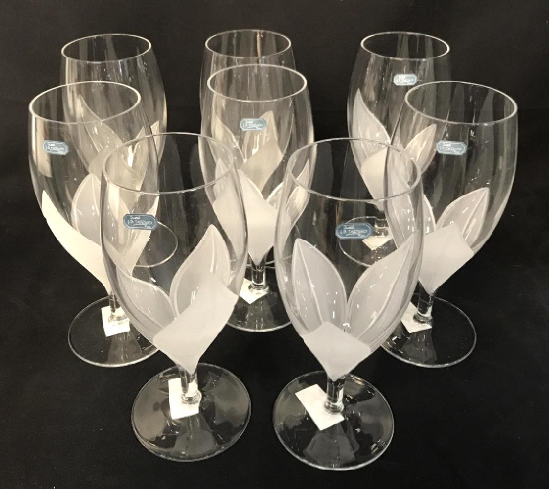 Set 12 CRISTAL DURAND Linette Water Goblets: Set of 12 CRISTAL D'ARQUES-DURAND water / iced beverage goblet glasses. Hand Blown Crystal glasses are in ‘Linette’ style, with detailed etched glass stylized as floral petals. Glasses have Durand