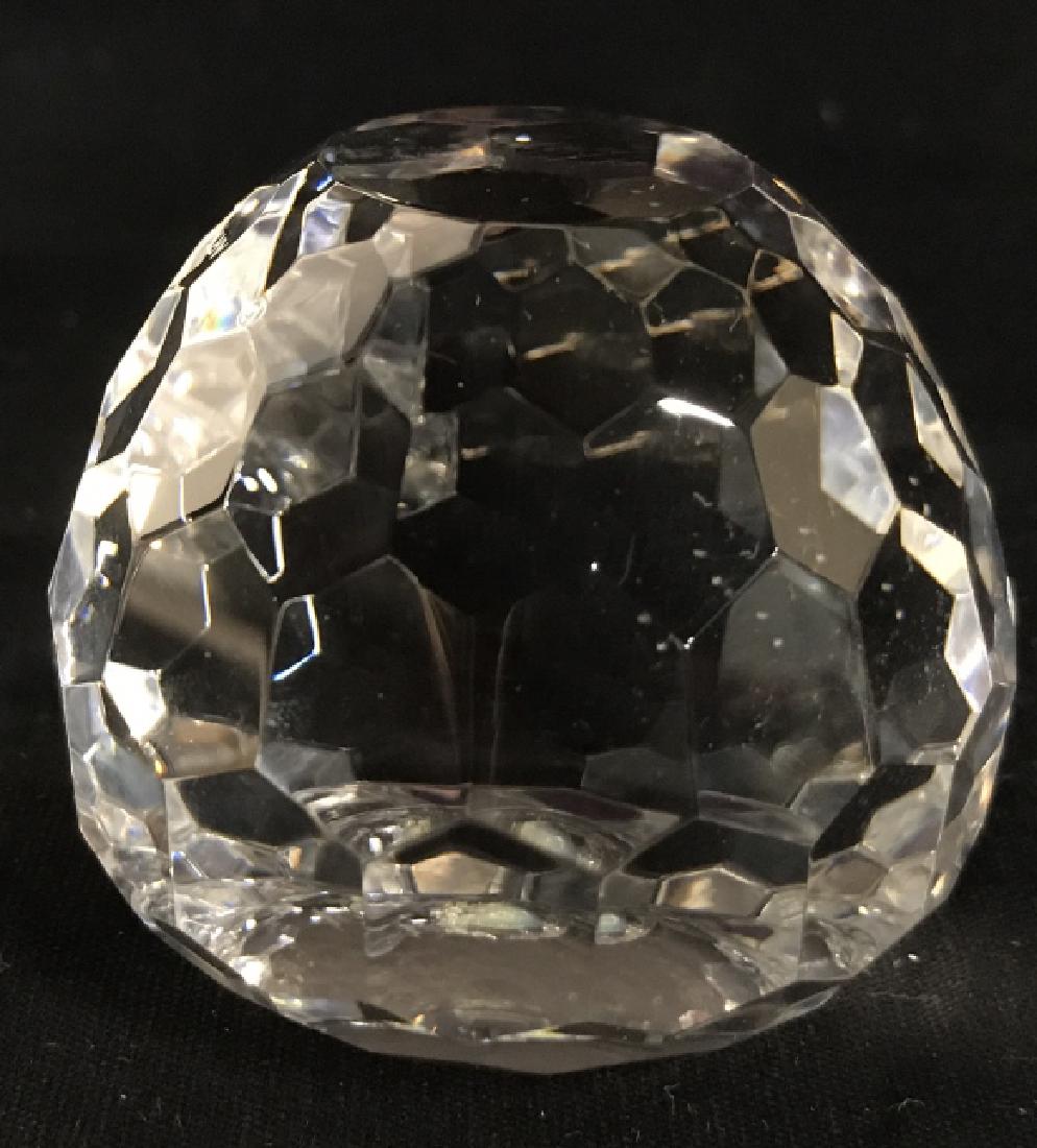 NYC ART Hand Blown Cut Glass Paperweight: NYC ART Hand blown cut glass paperweight, possibly crystal. Marked for NYC-Art. Pontil mark on underside. Approx 2 inches in height by 2.4 inches in diameter. Minor scratches on surface. Decorative ta