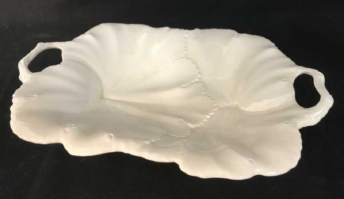 SPODE Ceramic Leaf Design Serving Platter: SPODE England Ceramic leaf / lily pad design serving platter. Platter is cream in tone. Marked for Spode on underside. Approx 2 inches in height, 11.75 inches by 8.5 inches in length and width. CerMic