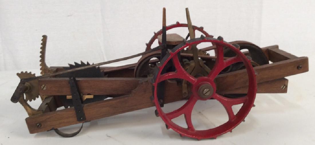 Antique Farmers Plow Collectible Toy Model: Antique Miniature Farmers Plow, Antique Model, Antique Toy, reticulated gears, wood, metal, iron, brass, 17 in x 8 in, possibly a saw or stump grinder, a demo model, Dimnutive Farm Equipment, Farm Equ