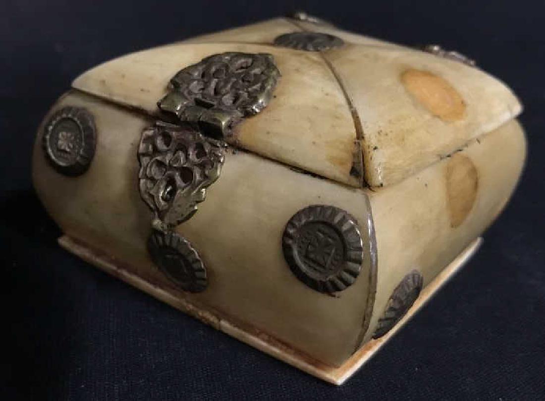 Vintage Bronze and Poss Bone Trinket Box, India: Diminutive vintage, possibly antique, bronze and poss bone or horn trinket / keepsake box. Box interior has deep blue soft fabric interior. Due to age, interior lining is worn and some Bronx embellish